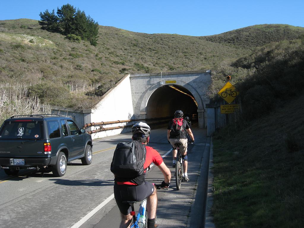IMG_1954 Dincer and Ergin riding into the tunnel to Sausalito on Bunker Rd